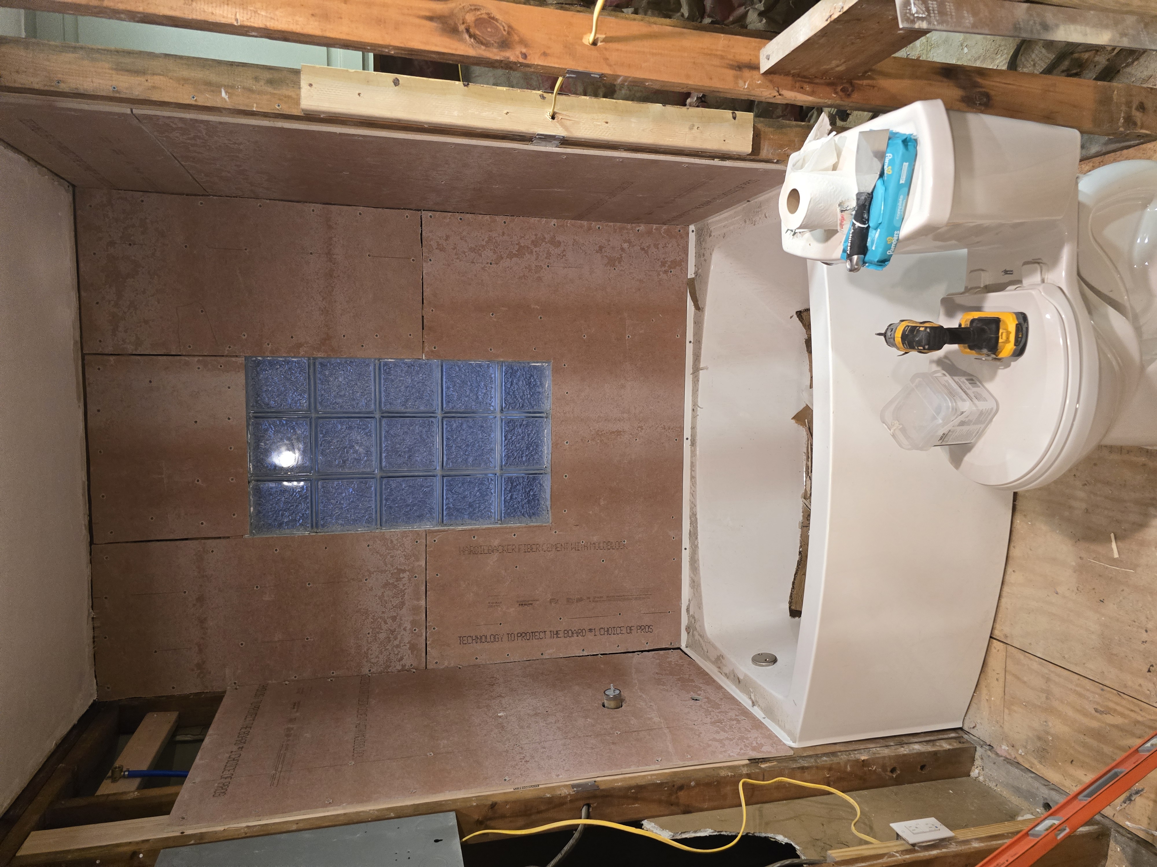 Bathroom rebuild — stripped to the studs with new backer board, ready to tile